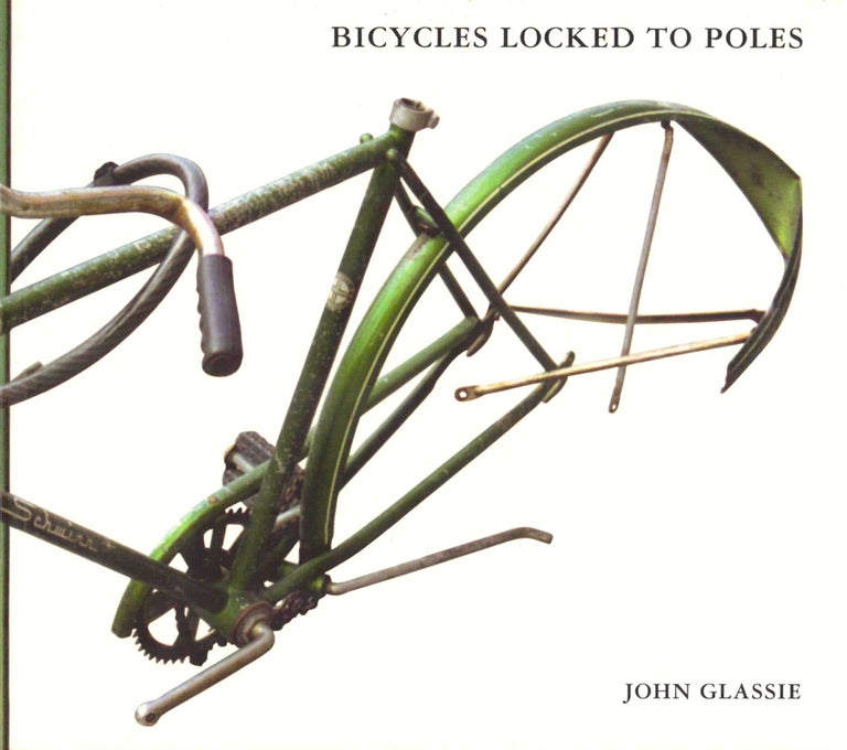 Item #38477 Bicycles Locked to Poles. John Glassie.